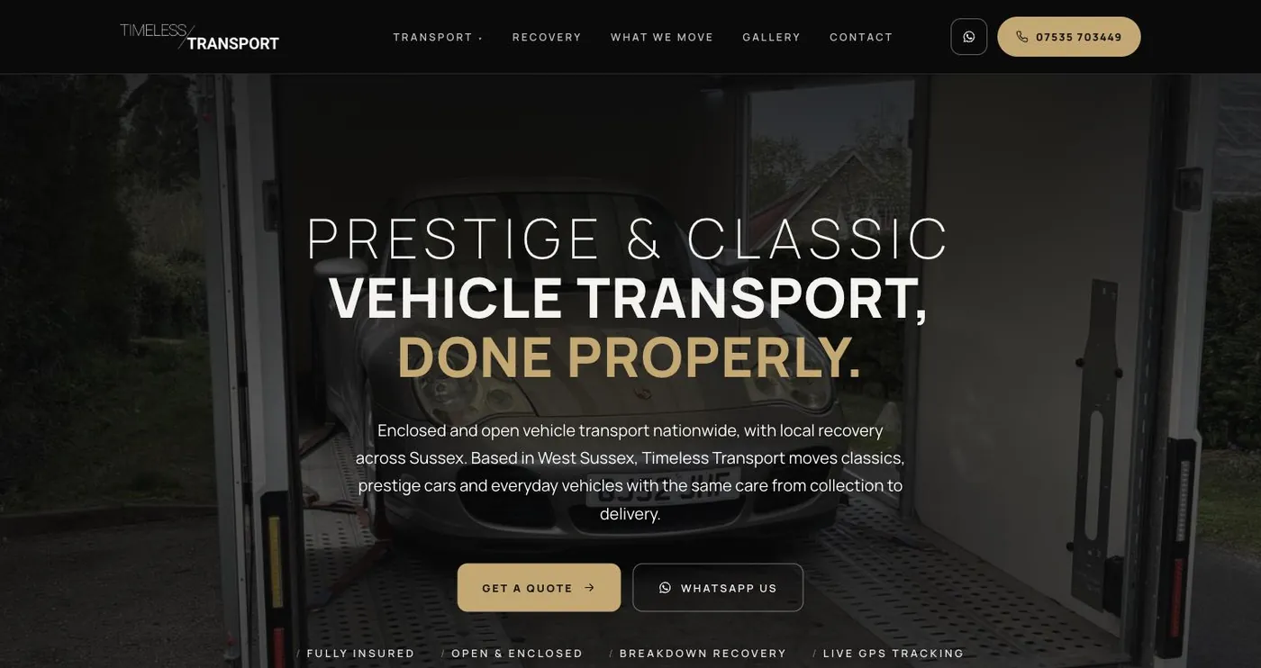 The rebuilt Timeless Transport home page, dark with a photograph of a car inside the enclosed trailer